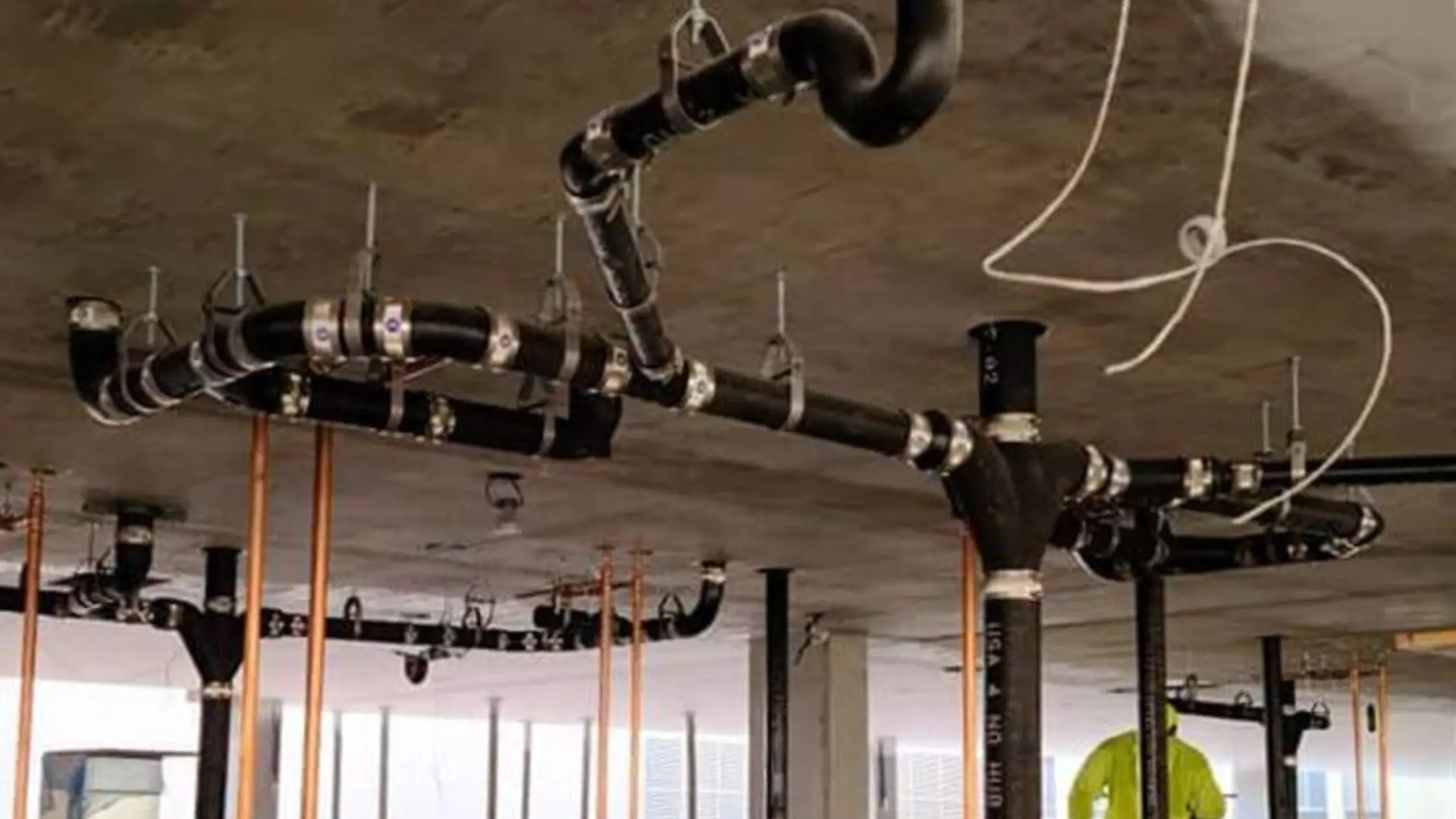 cast iron pipes in a building.